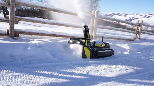 Yarbo snow blower clearing a snowy path