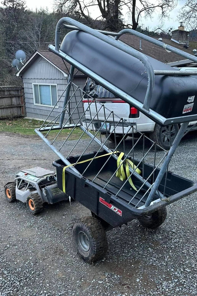 Mowrator S1 towing a garden cart