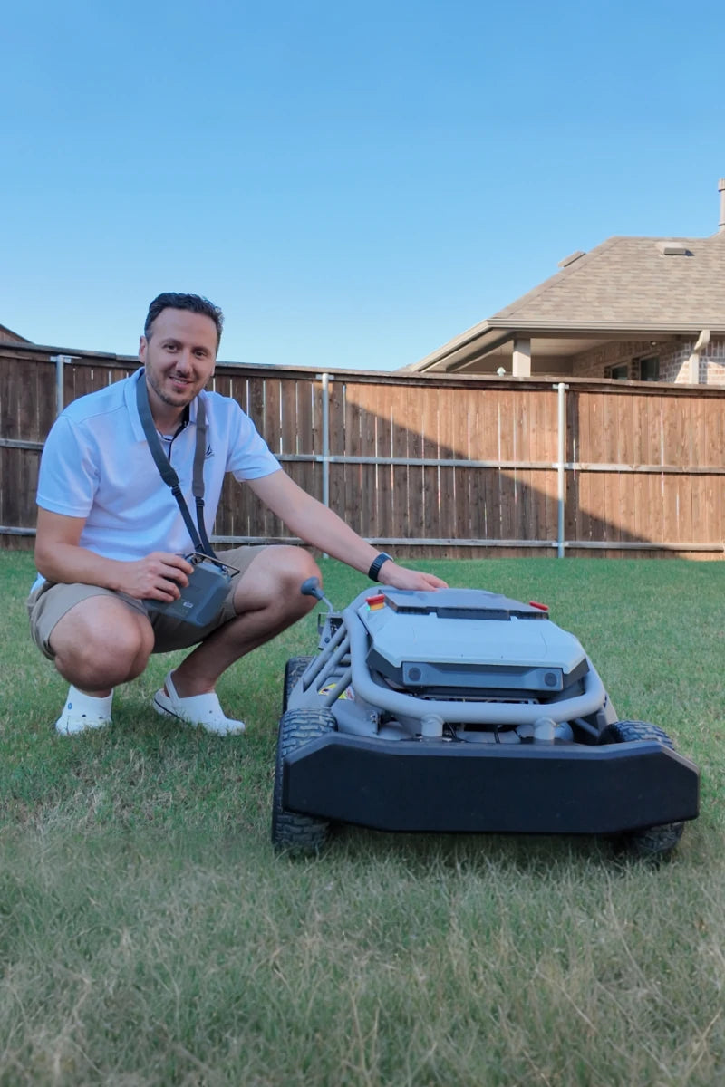 Owner kneeling beside his Mowrator S1