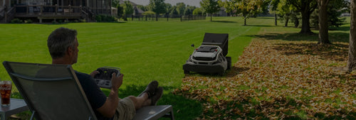 Homeowner relaxing while the Mowrator mows
