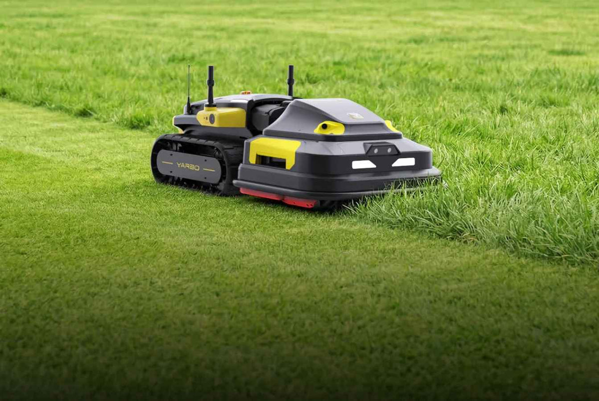 Yarbo with the Lawn Mower Pro module mowing a green lawn